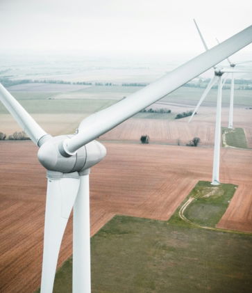 three white windmill during daytime