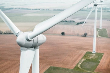 three white windmill during daytime